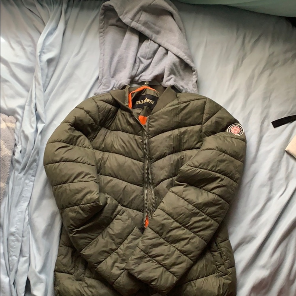 Green jacket with grey hood.
